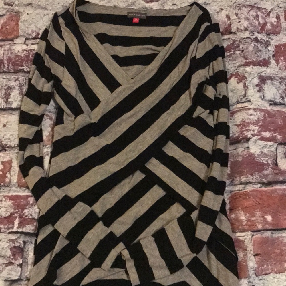 Women’s black and gray long sleeve shirt.